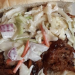 A Pulled Pork Sandwich With Coleslaw