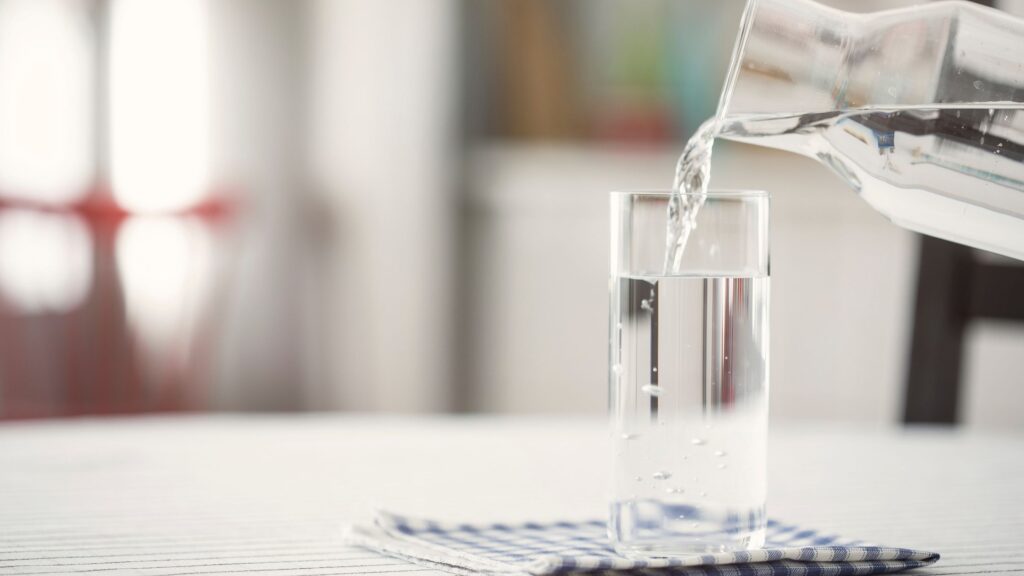 Pouring A Glass Of Water