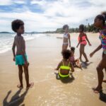 Black Kids Having Fun On The Beach